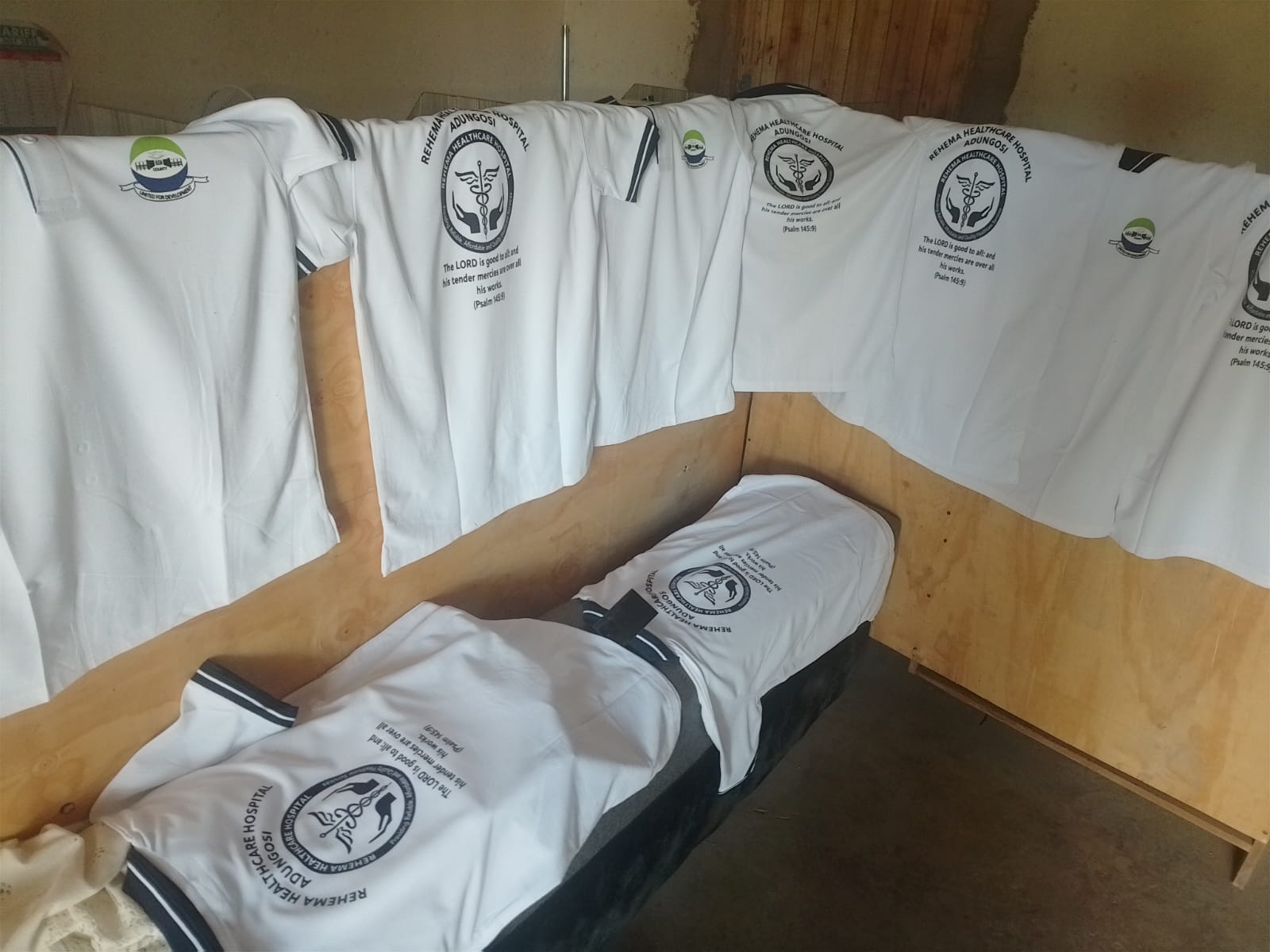 Batch of branded corporate polo shirts printed for Rehema Healthcare hospital